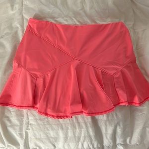 Luck in Love tennis skirt size Med(8-10) peachy color